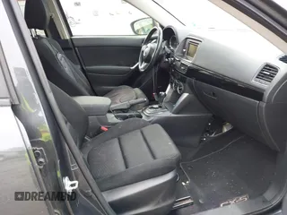 2014 Mazda CX-5 Touring with VIN JM3KE2CYXE0332517, listed as a IAAI auction lot 42109592 with 138,214 mi miles. Bid and sale history available at carsss.com. Image 5.