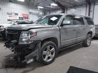 2018 Chevrolet Suburban Premier z VIN 1GNSKJKC9JR100134, wystawiony jako IAAI lot #41449255 z przebiegiem 111 528 mil mil oraz . Historia ofert i sprzedaży dostępna na DreamBid. Obrazek 17.