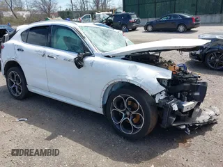2020 Alfa Romeo Stelvio Ti z VIN ZASPAKBN9L7C76146, wystawiony jako IAAI lot #42038751 z przebiegiem 29 107 mil mil oraz . Historia ofert i sprzedaży dostępna na DreamBid. Obrazek 1.