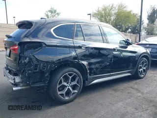 2019 BMW X1 sDrive28i with VIN WBXHU7C59K5L12320, listed as a IAAI auction lot 42116860 with 28,183 mi miles and . Bid and sale history available at DreamBid. Image 6.