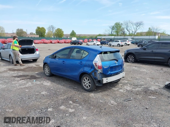 2014 Toyota Prius One with VIN JTDKDTB33E1565723, listed as a IAAI auction lot 42070826 with 145,811 mi miles and . Bid and sale history available at DreamBid. Image 3.