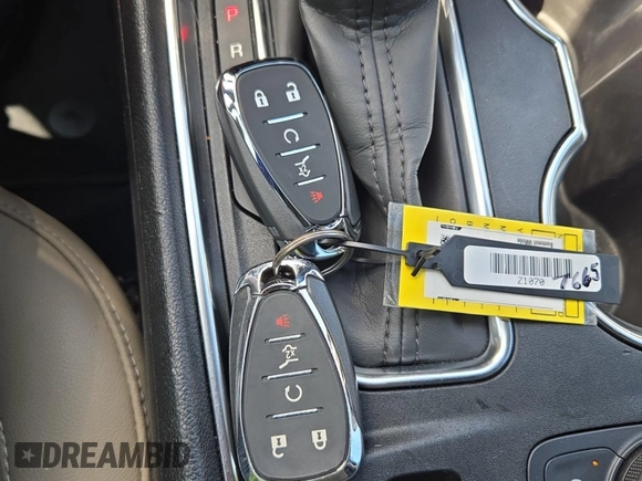 2022 Chevrolet Traverse LT with VIN 1GNERHKW7NJ177665, listed as a IAAI auction lot 42667314 with 103,830 mi miles and . Bid and sale history available at DreamBid. Image 41.