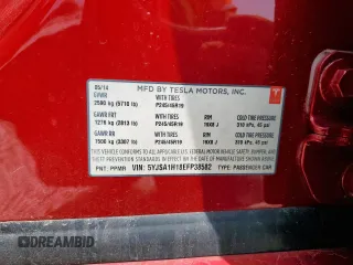 2014 Tesla Model S 60 with VIN 5YJSA1H18EFP38582, listed as a Copart auction lot 56581735 with 69,106 mi miles and Salvage title. Bid and sale history available at DreamBid. Image 12.