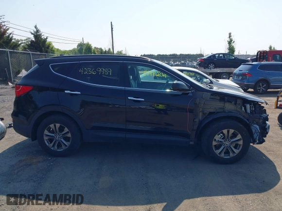 2014 Hyundai Santa Fe with VIN 5XYZUDLB9EG187420, listed as a IAAI auction lot 42369989 with 181,713 mi miles and . Bid and sale history available at DreamBid. Image 14.