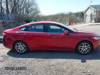 2014 Ford Fusion SE with VIN 3FA6P0H72ER161423, listed as a IAAI auction lot 42077344 with 105,505 mi miles and . Bid and sale history available at DreamBid. Image 14.