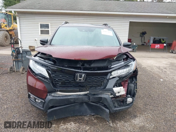 2019 Honda Passport Touring z VIN 5FNYF8H99KB005625, wystawiony jako IAAI lot #41905030 z przebiegiem 64 998 mil mil oraz . Historia ofert i sprzedaży dostępna na DreamBid. Obrazek 13.