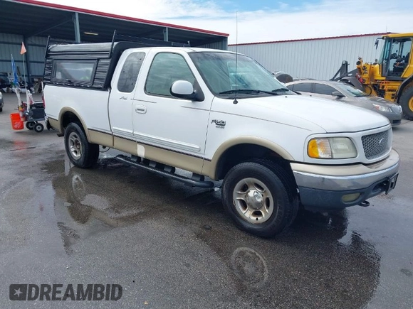 1999 Ford F-150 XL with VIN 1FTRX18LXXNA16159, listed as a IAAI auction lot 41746440 with 999,999 mi miles. Bid and sale history available at carsss.com. Image 1.