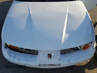 2001 Saturn SL z VIN 1G8ZK52771Z219294, wystawiony jako Copart lot #83155494 z przebiegiem 190 338 mil mil oraz Szkody całkowita. Historia ofert i sprzedaży dostępna na DreamBid. Obrazek 11.
