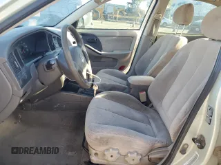 2004 Hyundai Elantra GLS z VIN KMHDN46D64U919337, wystawiony jako Copart lot #54627945 z przebiegiem 184 087 mil mil oraz Szkody całkowita. Historia ofert i sprzedaży dostępna na DreamBid. Obrazek 7.