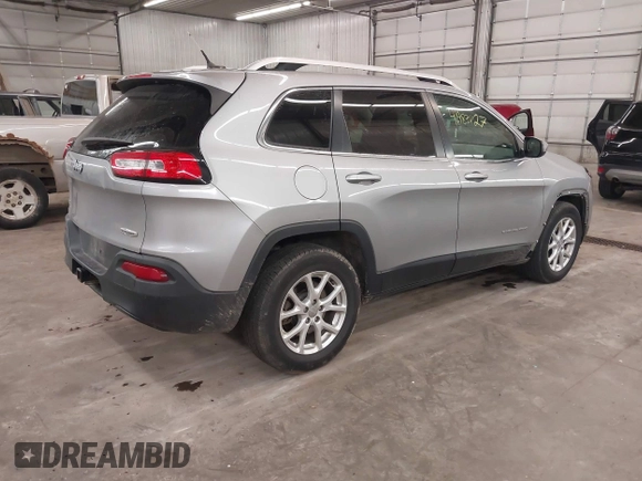 2014 Jeep Cherokee Altitude with VIN 1C4PJMCB9EW149754, listed as a IAAI auction lot 41983427 with 199,810 mi miles and . Bid and sale history available at DreamBid. Image 4.