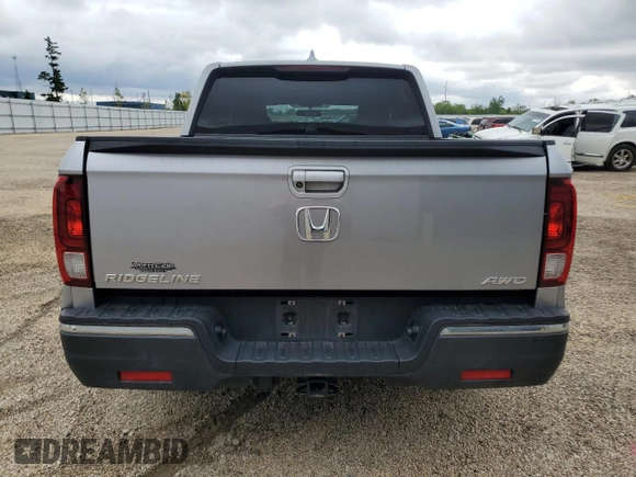 2019 Honda Ridgeline Sport with VIN 5FPYK3F17KB042627, listed as a Copart auction lot 57840035 with 82,555 mi miles and Salvage title. Bid and sale history available at DreamBid. Image 6.