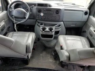 2011 Ford Econoline Passenger XL with VIN 1FMNE1BW2BDA00300, listed as a Copart auction lot 74028854 with 179,955 mi miles and Salvage Title. Bid and sale history available at DreamBid. Image 8.