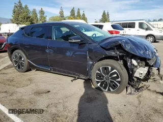 2023 Kia EV6 Wind with VIN KNDC34LA9P5602084, listed as a Copart auction lot 77227004 with 40,630 mi miles and Salvage Title. Bid and sale history available at carsss.com. Image 4.