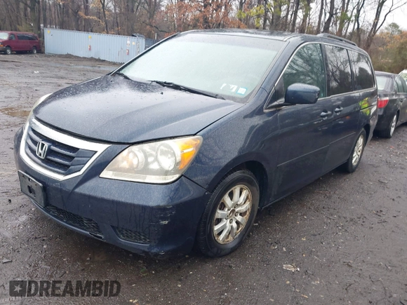 2010 Honda Odyssey EX with VIN 5FNRL3H41AB061674, listed as a IAAI auction lot 41954700 with 115,722 mi miles. Bid and sale history available at carsss.com. Image 2.