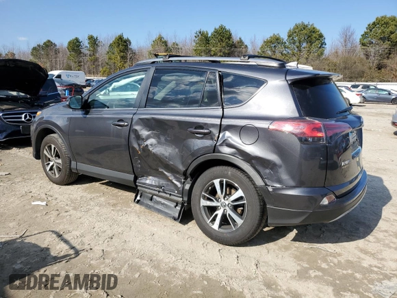 2018 Toyota RAV4 XLE with VIN 2T3RFREV3JW848384, listed as a Copart auction lot 88758945 with 28,951 mi miles and Salvage Title. Bid and sale history available at DreamBid. Image 2.