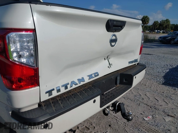 2016 Nissan Titan Platinum Reserve with VIN 1N6BA1F4XGN517905, listed as a IAAI auction lot 42676671 with 110,004 mi miles and . Bid and sale history available at DreamBid. Image 6.