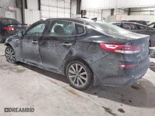 2019 Kia Optima LX with VIN 5XXGT4L3XKG377990, listed as a IAAI auction lot 41636972 with 140,864 mi miles. Bid and sale history available at carsss.com. Image 3.
