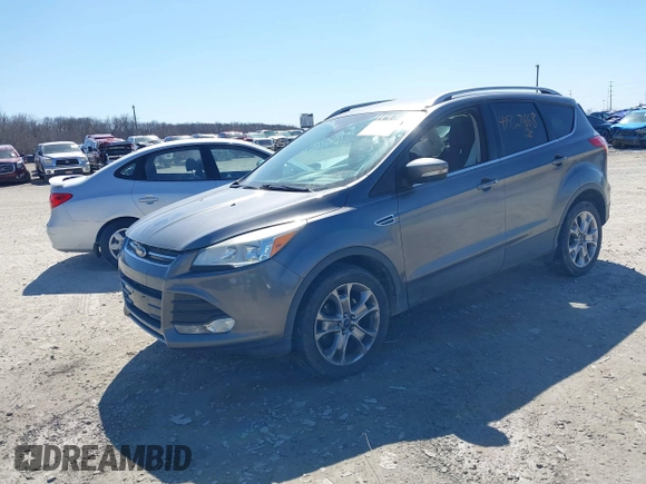 2014 Ford Escape Titanium with VIN 1FMCU9J93EUC72752, listed as a IAAI auction lot 41827668 with 91,194 mi miles and . Bid and sale history available at DreamBid. Image 17.