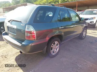 2005 Acura MDX Touring with VIN 2HNYD18725H551865, listed as a IAAI auction lot 42715088 with 206,235 mi miles and . Bid and sale history available at DreamBid. Image 4.