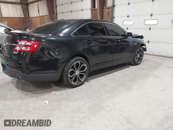 2015 Ford Taurus SHO with VIN 1FAHP2KT0FG132988, listed as a IAAI auction lot 42042314 with 192,974 mi miles and . Bid and sale history available at DreamBid. Image 4.