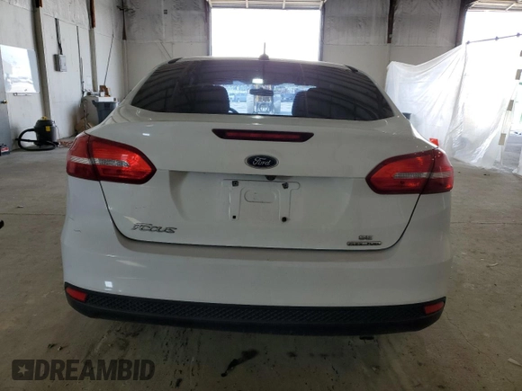 2016 Ford Focus SE z VIN 1FADP3F26GL404670, wystawiony jako Copart lot #52876095 z przebiegiem 80 425 mil mil oraz Szkoda całkowita • Salvage title. Historia ofert i sprzedaży dostępna na DreamBid. Obrazek 6.