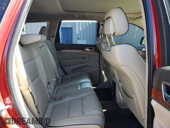 2011 Jeep Grand Cherokee Overland with VIN 1J4RR6GT8BC606688, listed as a Copart auction lot 57182295 with 100,423 mi miles and Salvage title. Bid and sale history available at DreamBid. Image 11.