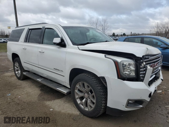2017 GMC Yukon XL SLE with VIN 1GKS2FKC2HR215016, listed as a Copart auction lot 49651765 with 144,603 mi miles and Salvage Title. Bid and sale history available at carsss.com. Image 4.