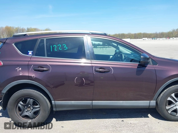 2016 Toyota RAV4 LE with VIN 2T3ZFREV4GW284902, listed as a IAAI auction lot 42054633 with 117,463 mi miles and . Bid and sale history available at carsss.com. Image 14.
