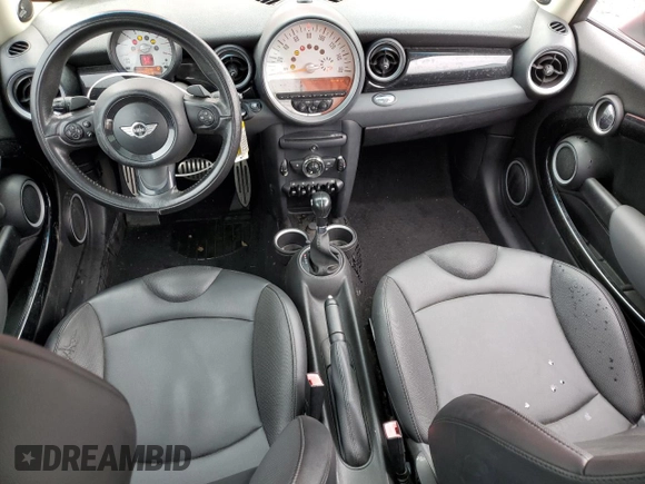 2012 MINI Hardtop S with VIN WMWSV3C59CT385254, listed as a Copart auction lot 52675675 with 76,250 mi miles and Salvage Title. Bid and sale history available at DreamBid. Image 8.