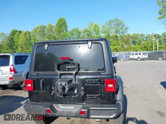 2022 Jeep Wrangler Unlimited Rubicon with VIN 1C4HJXFNXNW149063, listed as a IAAI auction lot 42130171 with 33,961 mi miles and . Bid and sale history available at DreamBid. Image 16.
