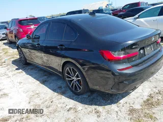 2019 BMW 3 Series 330i xDrive with VIN WBA5R7C51KFH25487, listed as a IAAI auction lot 40605403 with 1 mi miles. Bid and sale history available at carsss.com. Image 3.