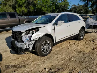 2023 Cadillac XT5 FWD Premium Luxury with VIN 1GYKNCR44PZ159038, listed as a Copart auction lot 50614465 with 11,781 mi miles and Salvage Title. Bid and sale history available at carsss.com. Image 1.