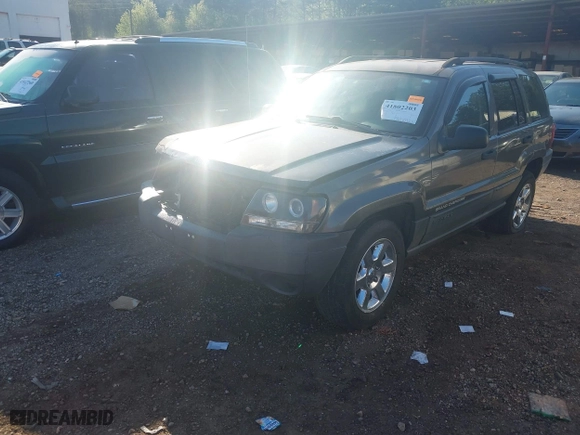 2004 Jeep Grand Cherokee Laredo with VIN 1J4GX48S44C394429, listed as a IAAI auction lot 41802203 with 144,925 mi miles. Bid and sale history available at carsss.com. Image 2.
