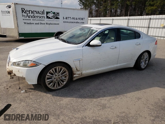 2012 Jaguar XF Portfolio with VIN SAJWA0HB4CLS36605, listed as a Copart auction lot 47179245 with 115,611 mi miles and Salvage Title. Bid and sale history available at carsss.com. Image 1.