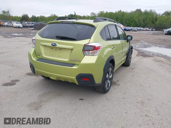 2014 Subaru Crosstrek Touring with VIN JF2GPBKC0EH279005, listed as a IAAI auction lot 42286421 with 99,720 mi miles and . Bid and sale history available at DreamBid. Image 4.