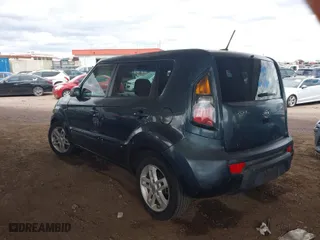 2011 Kia Soul + with VIN KNDJT2A27B7335161, listed as a IAAI auction lot 41779090 with 161,842 mi miles. Bid and sale history available at carsss.com. Image 3.