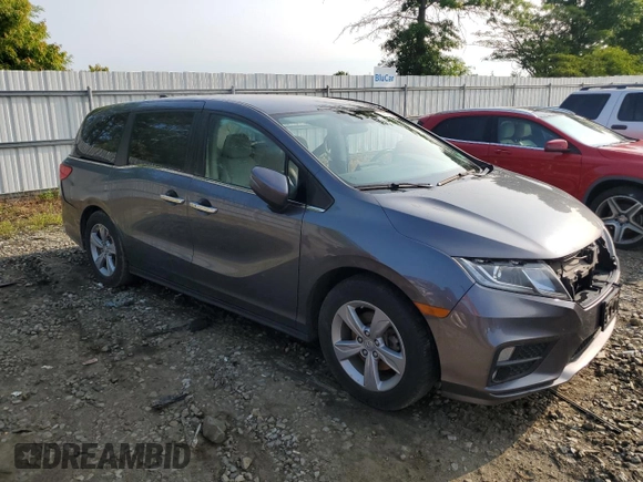 2019 Honda Odyssey EX with VIN 5FNRL6H58KB013889, listed as a Copart auction lot 57077025 with 126,467 mi miles and Salvage title. Bid and sale history available at DreamBid. Image 4.