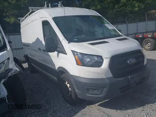 2020 Ford Transit Cargo z VIN 1FTBR1C83LKB26030, wystawiony jako IAAI lot #42667583 z przebiegiem 83 826 mil mil oraz . Historia ofert i sprzedaży dostępna na DreamBid. Obrazek 1.