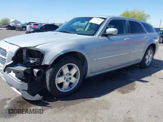 2005 Dodge Magnum z VIN 2D8GZ58235H576127, wystawiony jako IAAI lot #41989680 z przebiegiem 136 488 mil mil oraz . Historia ofert i sprzedaży dostępna na DreamBid. Obrazek 18.