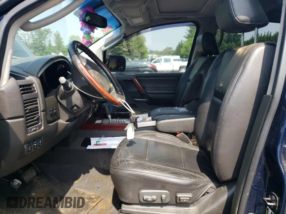 2007 Infiniti QX56 z VIN 5N3AA08C87N806622, wystawiony jako Copart lot #57411845 z przebiegiem 218 557 mil mil oraz Czysty tytuł • Clean title. Historia ofert i sprzedaży dostępna na DreamBid. Obrazek 7.