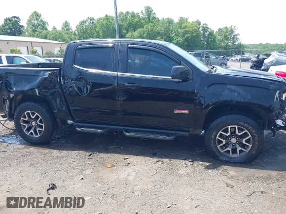2016 GMC Canyon 4WD SLE z VIN 1GTG6CE35G1171168, wystawiony jako IAAI lot #42275447 z przebiegiem 171 581 mil mil oraz . Historia ofert i sprzedaży dostępna na DreamBid. Obrazek 13.