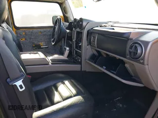 2003 Hummer H2 z VIN 5GRGN23UX3H124727, wystawiony jako IAAI lot #41697787 z przebiegiem 241 554 mil mil oraz . Historia ofert i sprzedaży dostępna na DreamBid. Obrazek 5.