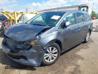 2014 Honda Odyssey EX-L with VIN 5FNRL5H60EB117218, listed as a IAAI auction lot 42201739 with 184,586 mi miles and . Bid and sale history available at DreamBid. Image 6.