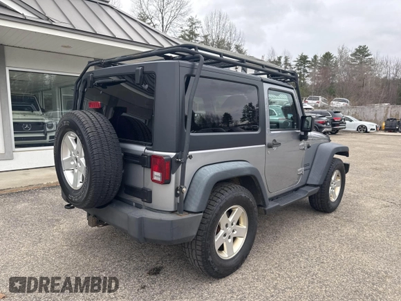 2013 Jeep Wrangler Sport with VIN 1C4AJWAG7DL605881, listed as a IAAI auction lot 41980930 with 214,662 mi miles and . Bid and sale history available at carsss.com. Image 4.