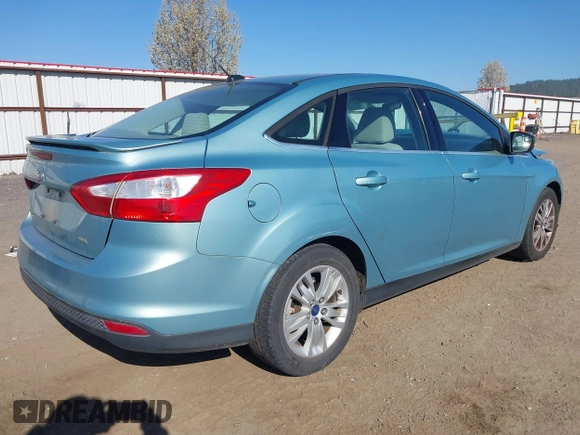 2012 Ford Focus SEL with VIN 1FAHP3H23CL417403, listed as a IAAI auction lot 42043152 with 140,604 mi miles. Bid and sale history available at carsss.com. Image 4.