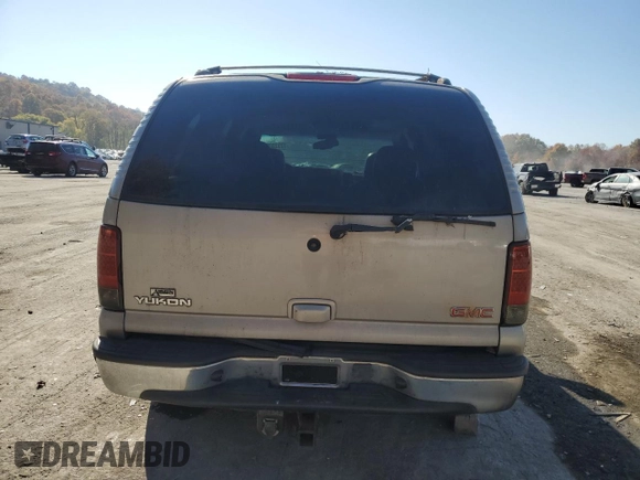 2004 GMC Yukon SLE with VIN 1GKEK13T74J249122, listed as a Copart auction lot 77323354 with 0 mi miles and Clean Title. Bid and sale history available at carsss.com. Image 6.