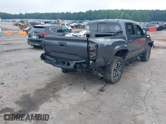 2022 Toyota Tacoma SR with VIN 3TMCZ5AN2NM507478, listed as a IAAI auction lot 42425907 with 40,796 mi miles and . Bid and sale history available at DreamBid. Image 4.