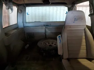 1993 GMC Safari z VIN 1GKDM15W6PB504662, wystawiony jako Copart lot #72306913 z przebiegiem 333 276 mil mil oraz Tytuł czysty. Historia ofert i sprzedaży dostępna na DreamBid. Obrazek 10.