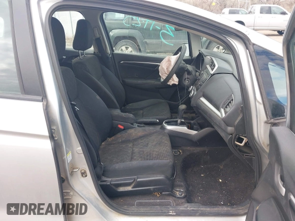 2015 Honda Fit LX with VIN 3HGGK5H57FM784299, listed as a IAAI auction lot 41863989 with 169,657 mi miles. Bid and sale history available at carsss.com. Image 5.