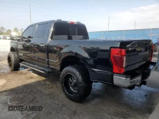 2021 Ford Super Duty F-250 SRW XL with VIN 1FT7W2BT1MEC51277, listed as a Copart auction lot 43544475 with 99,324 mi miles and Salvage Title. Bid and sale history available at carsss.com. Image 2.